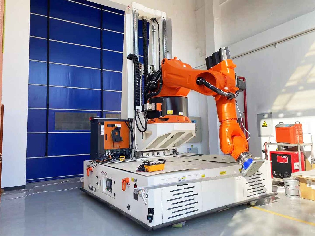 Application of 4t Omnidirectional AGV in Carrying Robot Arm